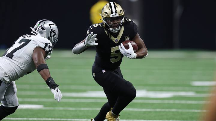 Sep 27, 2026; New Orleans, Louisiana, USA; New Orleans Saints running back Kendre Miller (5) carries the ball while defended by Las Vegas Raiders linebacker Nakobe Dean (17) int he third quarter at Caesars Superdome. Sep 27, 2026; New Orleans, Louisiana, USA; New Orleans Saints running back Kendre Miller (5) carries the ball while defended by Las Vegas Raiders linebacker Nakobe Dean (17) int he third quarter at Caesars Superdome.