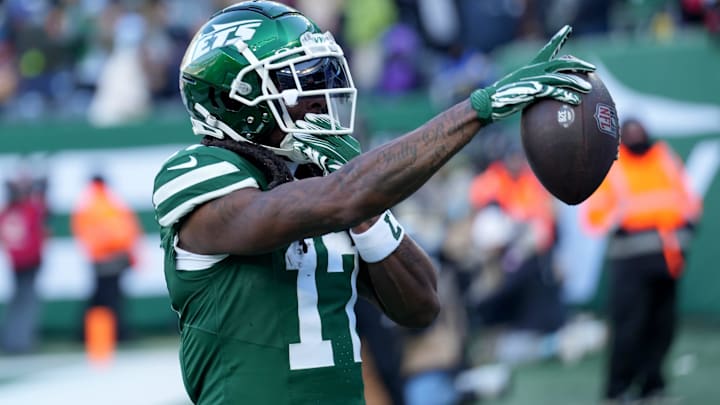 New York Jets wide receiver Davante Adams (17) celebrates after getting on the scoreboard first with a first quarter touchdown, Sunday, December 22, 2024, in East Rutherford.