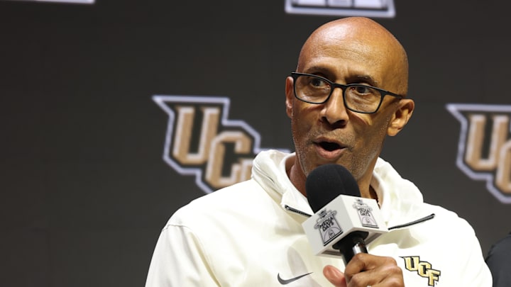 Oct 22, 2025; Kansas City, MO, USA; UCF head coach Johnny Dawkins speaks to media during Big 12 Menís Basketball media day at T-Mobile Center. Mandatory Credit: Sophia Scheller-Imagn Images