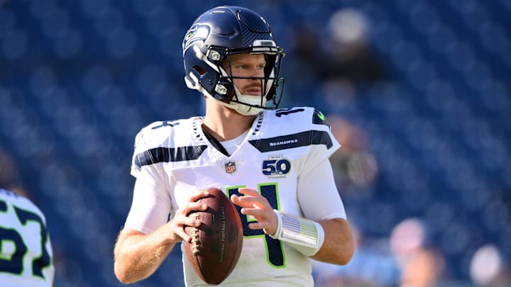 Nov 23, 2025; Nashville, Tennessee, USA;  Seattle Seahawks quarterback Sam Darnold (14) warms up before a game against the Tennessee Titans at Nissan Stadium.