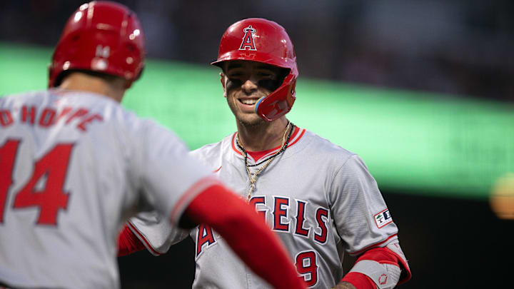 Jun 14, 2024; San Francisco, California, USA; Los Angeles Angels shortstop Zach Neto (9) is greeted by teammate Los Logan O'Hoppe (14) after hitting a two-run home run against the San Francisco Giants during the fourth inning at Oracle Park. Mandatory Credit: D. Ross Cameron-Imagn Images Jun 14, 2024; San Francisco, California, USA; Los Angeles Angels shortstop Zach Neto (9) is greeted by teammate Los Logan O'Hoppe (14) after hitting a two-run home run against the San Francisco Giants during the fourth inning at Oracle Park. Mandatory Credit: D. Ross Cameron-Imagn Images