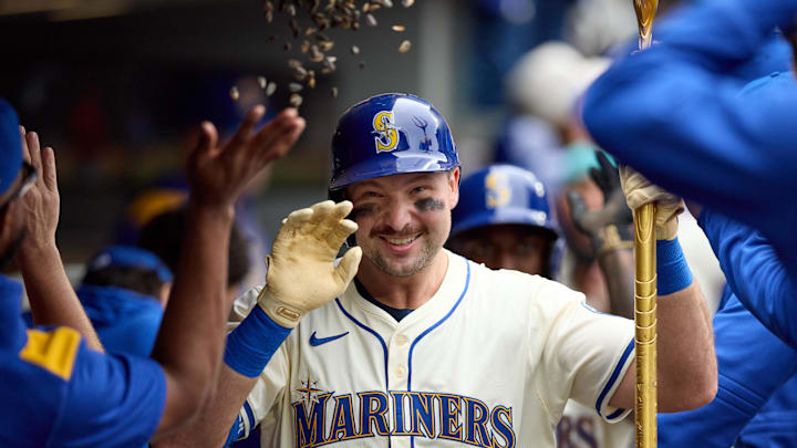 Mariners catcher Cal Raleigh made history with two home runs on Tuesday night.