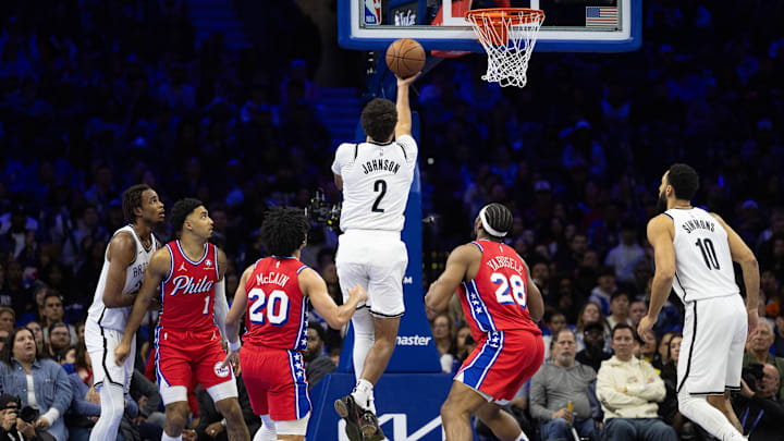 Nov 22, 2024; Philadelphia, Pennsylvania, USA; Brooklyn Nets forward Cameron Johnson (2) drives for a score against the Philadelphia 76ers during the fourth quarter at Wells Fargo Center. Mandatory Credit: Bill Streicher-Imagn Images