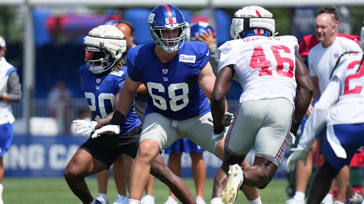 Jul 26, 2024; East Rutherford, NJ, USA; New York Giants offensive tackle Matt Nelson (68) blocks during training camp at Quest Diagnostics Training Center. Mandatory Credit: Lucas Boland-Imagn Images