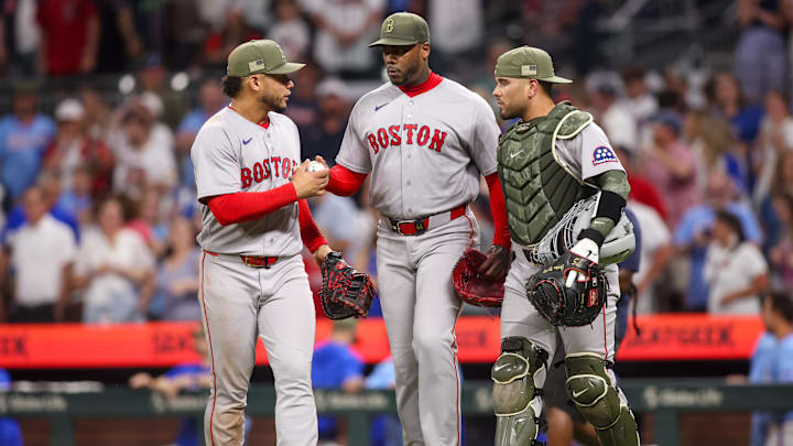 May 16, 2026; Atlanta, Georgia, USA; Boston Red Sox first baseman Willson Contreras (40) and pitcher Aroldis Chapman (44) and catcher Carlos Narvaez (75) celebrate after a victory over the Atlanta Braves at Truist Park. Mandatory Credit: Brett Davis-Imagn Images