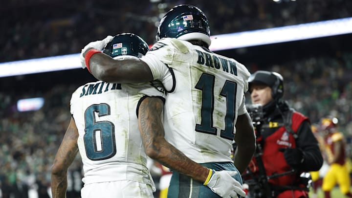 Dec 20, 2025; Landover, Maryland, USA; Philadelphia Eagles wide receiver Devonta Smith (6) celebrates with wide receiver A.J. Brown (11) after making a catch for a touchdown against the Washington Commanders in the first half at Northwest Stadium. Mandatory Credit: Geoff Burke-Imagn Images