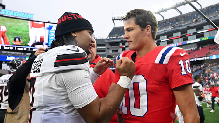 Oct 13, 2024; Foxborough, Massachusetts, USA; Houston Texans quarterback C.J. Stroud (7) high-fives New England Patriots quarterback Drake Maye (10) after a game at Gillette Stadium. Mandatory Credit: Brian Fluharty-Imagn Images Oct 13, 2024; Foxborough, Massachusetts, USA; Houston Texans quarterback C.J. Stroud (7) high-fives New England Patriots quarterback Drake Maye (10) after a game at Gillette Stadium. Mandatory Credit: Brian Fluharty-Imagn Images