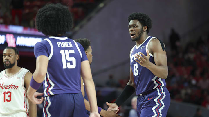 Jan 6, 2025; Houston, Texas, USA; TCU Horned Frogs center Ernest Udeh Jr. (8) reacts after a play during the second half against the Houston Cougars at Fertitta Center. Mandatory Credit: Troy Taormina-Imagn Images