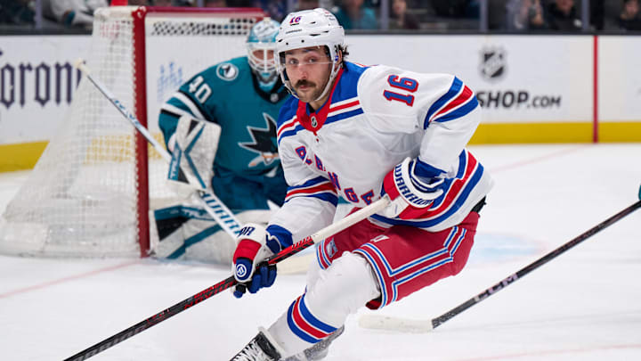 Mar 29, 2025; San Jose, California, USA; New York Rangers center Vincent Trocheck (16) skates with the puck against San Jose Sharks goaltender Alexandar Georgiev (40) during the first period at SAP Center at San Jose. Mandatory Credit: Robert Edwards-Imagn Images