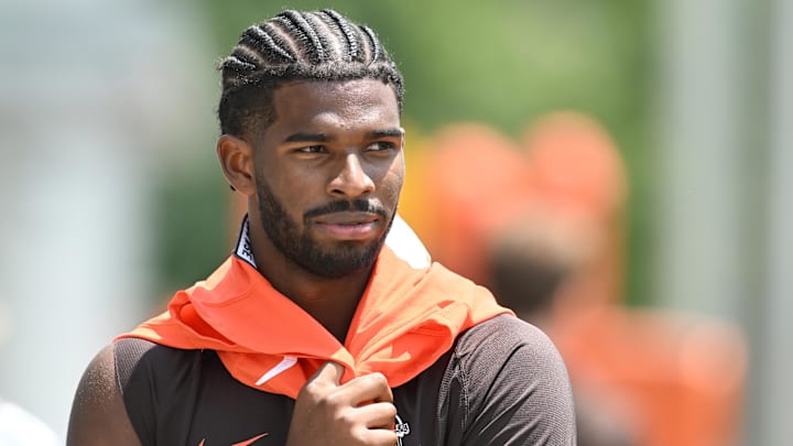 Jun 10, 2025; Berea, OH, USA; Cleveland Browns quarterback Shedeur Sanders (12) walks off the field during minicamp at CrossCountry Mortgage Campus. Mandatory Credit: Ken Blaze-Imagn Images Jun 10, 2025; Berea, OH, USA; Cleveland Browns quarterback Shedeur Sanders (12) walks off the field during minicamp at CrossCountry Mortgage Campus. Mandatory Credit: Ken Blaze-Imagn Images