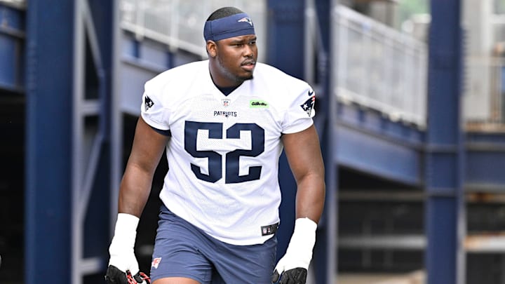 Jun 9, 2025; Foxborough, MA, USA; New England Patriots offensive tackle Marcus Bryant (52) walks to the practice fields at Gillette Stadium. Mandatory Credit: Eric Canha-Imagn Images