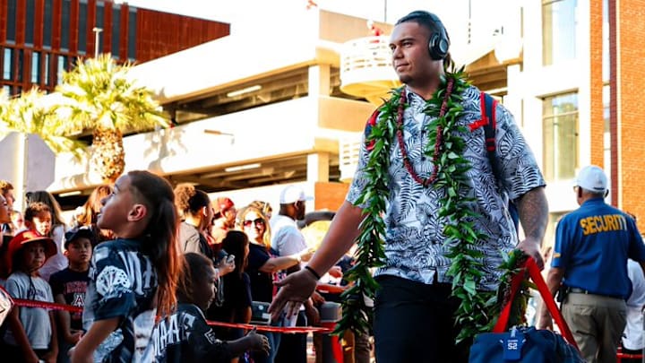 Arizona entering the stadium for its opening game against Hawaii
