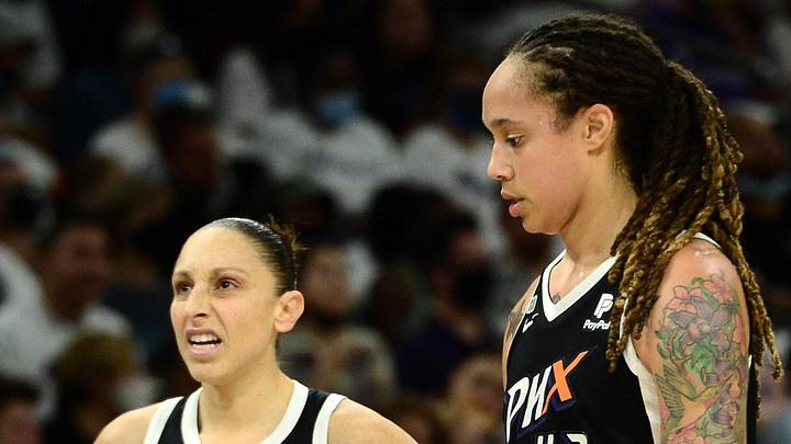 Oct 10, 2021; Phoenix, Arizona, USA; Phoenix Mercury guard Diana Taurasi (3) and Phoenix Mercury center Brittney Griner (42) look on against the Chicago Sky during the second half of game one of the 2021 WNBA Finals at Footprint Center. Mandatory Credit: Joe Camporeale-Imagn Images