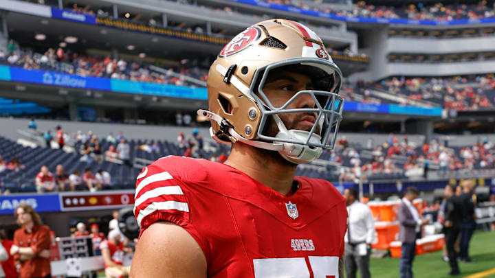 San Francisco 49ers right guard Dominick Puni (77)