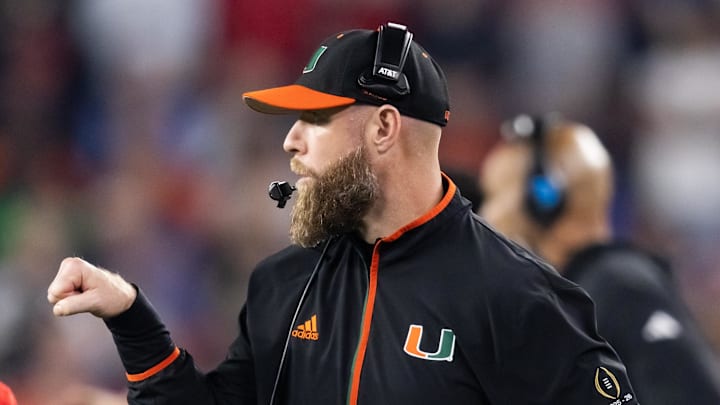 Jan 8, 2026; Glendale, AZ, USA; Miami Hurricanes defensive coordinator Corey Hetherman against the Mississippi Rebels during the 2026 Fiesta Bowl and semifinal game of the College Football Playoff at State Farm Stadium. Mandatory Credit: Mark J. Rebilas-Imagn Images