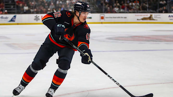 Coachella Valley forward Jani Nyman (12) advances the puck during the first period of Game 2 of the Pacific Division Finals at Acrisure Arena in Palm Desert, Calif., Friday, May 17, 2024.