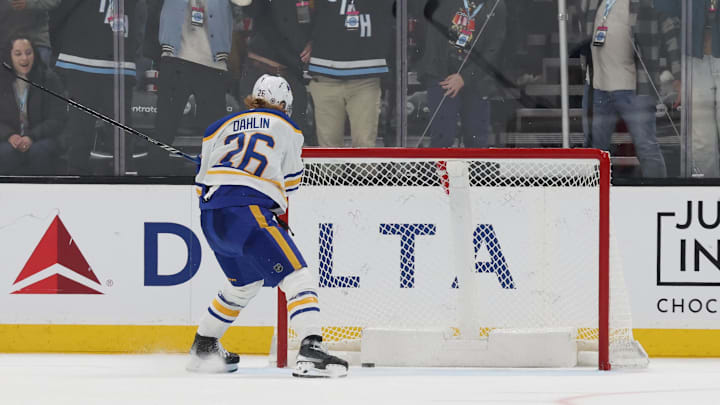 Mar 20, 2025; Salt Lake City, Utah, USA; Buffalo Sabres defenseman Rasmus Dahlin (26) tries to save a shot by the Utah Hockey Club on an open net during the third period at Delta Center. Mandatory Credit: Rob Gray-Imagn Images