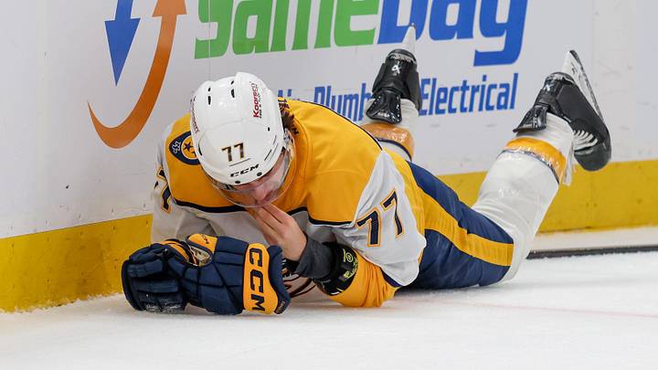 Apr 9, 2026; Salt Lake City, Utah, USA; Nashville Predators right wing Luke Evangelista (77) lies on the ice after a cross-check from Utah Mammoth defenseman Mikhail Sergachev (not pictured) during the third period at Delta Center. Mandatory Credit: Rob Gray-Imagn Images Apr 9, 2026; Salt Lake City, Utah, USA; Nashville Predators right wing Luke Evangelista (77) lies on the ice after a cross-check from Utah Mammoth defenseman Mikhail Sergachev (not pictured) during the third period at Delta Center. Mandatory Credit: Rob Gray-Imagn Images