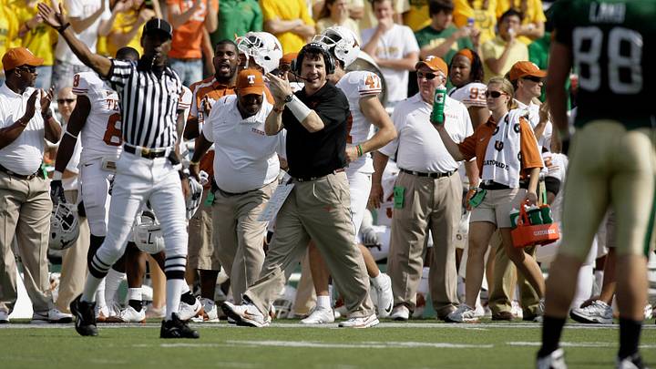 Texas Longhorns defensive coordinator Will Muschamp cheers for the defense against the Baylor Bears in the second quarter Texas Longhorns defensive coordinator Will Muschamp cheers for the defense against the Baylor Bears in the second quarter