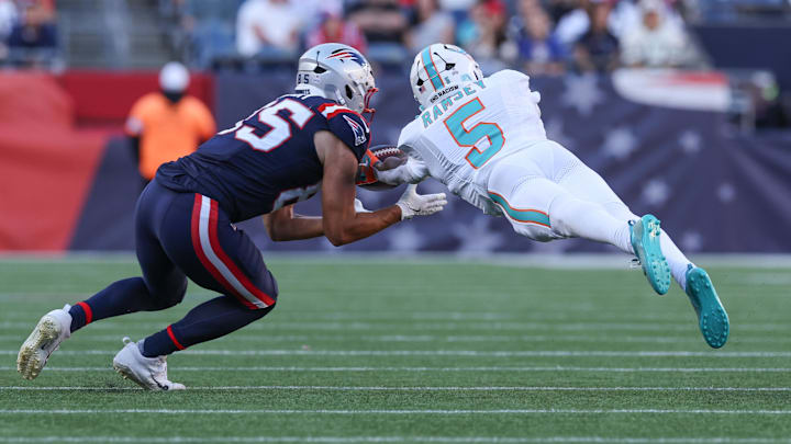 Miami Dolphins cornerback Jalen Ramsey (5) breaks up a pass to New England Patriots tight end Hunter Henry (85) during the second half at Gillette Stadium. Miami Dolphins cornerback Jalen Ramsey (5) breaks up a pass to New England Patriots tight end Hunter Henry (85) during the second half at Gillette Stadium.