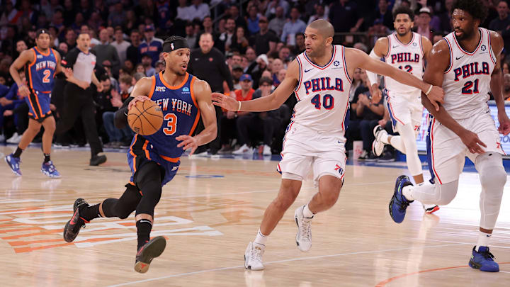 Apr 30, 2024; New York, New York, USA; New York Knicks guard Josh Hart (3) drives to the basket against Philadelphia 76ers forward Nicolas Batum (40) and center Joel Embiid (21) during the third quarter of game 5 of the first round of the 2024 NBA playoffs at Madison Square Garden. Mandatory Credit: Brad Penner-USA TODAY Sports