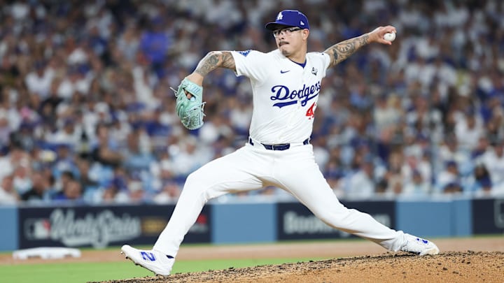 Oct 29, 2025; Los Angeles, California, USA; Los Angeles Dodgers pitcher Anthony Banda (43) pitches during the seventh inning against the Toronto Blue Jays during game five of the 2025 MLB World Series at Dodger Stadium.