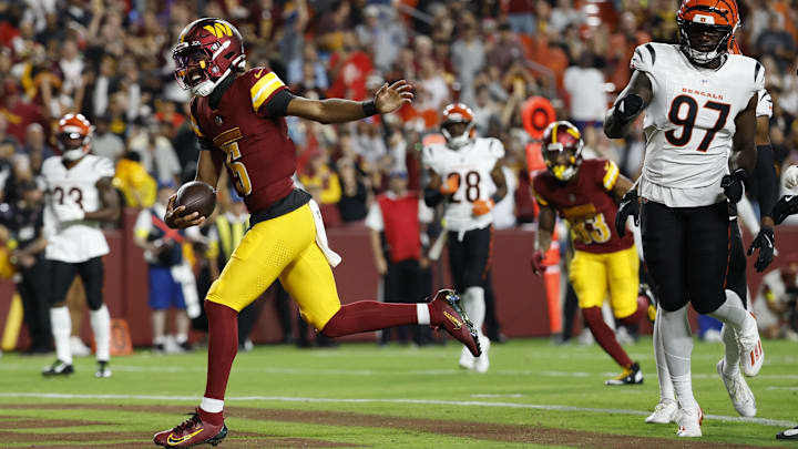 Washington Commanders quarterback Jayden Daniels scored a rushing touchdown during a preseason game against the Cincinnati Bengals.