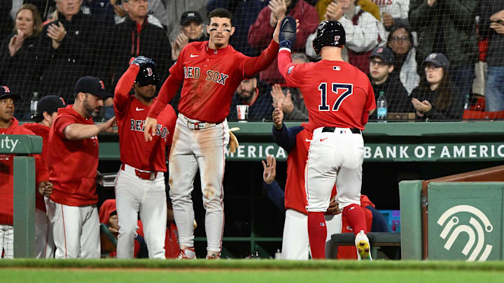Sep 20, 2024; Boston, Massachusetts, USA; Boston Red Sox left fielder Tyler O'Neill (17) high-fives center fielder Jarren Duran (16) after scoring a run against the Minnesota Twins during the fourth inning at Fenway Park. Mandatory Credit: Brian Fluharty-Imagn Images Sep 20, 2024; Boston, Massachusetts, USA; Boston Red Sox left fielder Tyler O'Neill (17) high-fives center fielder Jarren Duran (16) after scoring a run against the Minnesota Twins during the fourth inning at Fenway Park. Mandatory Credit: Brian Fluharty-Imagn Images
