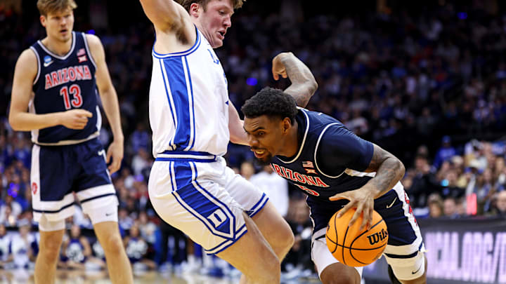 Arizona Wildcats guard KJ Lewis (5) is reportedly entering the college basketball transfer portal. Arizona Wildcats guard KJ Lewis (5) is reportedly entering the college basketball transfer portal.