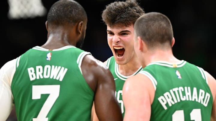 Dec 2, 2025; Boston, Massachusetts, USA; Boston Celtics guard Hugo Gonzalez (28) reacts with guard Jaylen Brown (7) and guard Payton Pritchard (11) during the first half of a game against the New York Knicks at the TD Garden. Dec 2, 2025; Boston, Massachusetts, USA; Boston Celtics guard Hugo Gonzalez (28) reacts with guard Jaylen Brown (7) and guard Payton Pritchard (11) during the first half of a game against the New York Knicks at the TD Garden.
