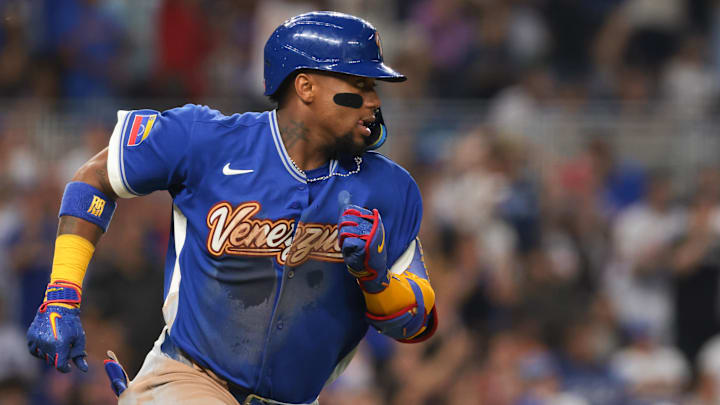 Mar 9, 2026; Miami, FL, United States; Venezuela right fielder Ronald Acuna Jr. (21) runs toward first base after hitting an RBI single against Nicaragua during the fifth inning at loanDepot Park. Mandatory Credit: Sam Navarro-Imagn Images