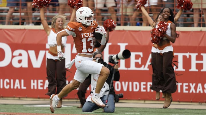 Sep 6, 2025; Austin, Texas, USA; Texas Longhorns wide receiver Parker Livingstone (13) runs for a touchdown during the first half against the San Jose State Spartansat Darrell K Royal-Texas Memorial Stadium. Mandatory Credit: Scott Wachter-Imagn Images Sep 6, 2025; Austin, Texas, USA; Texas Longhorns wide receiver Parker Livingstone (13) runs for a touchdown during the first half against the San Jose State Spartansat Darrell K Royal-Texas Memorial Stadium. Mandatory Credit: Scott Wachter-Imagn Images
