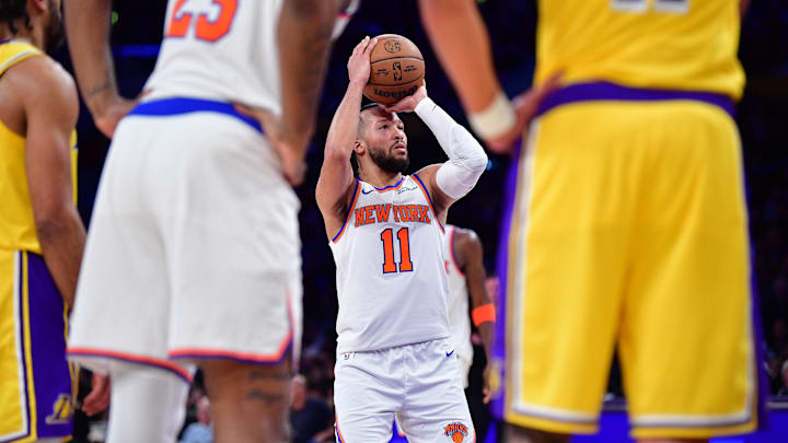 Mar 6, 2025; Los Angeles, California, USA; New York Knicks guard Jalen Brunson (11) shoots a free throw against the Los Angeles Lakers during the first half at Crypto.com Arena. Mandatory Credit: Gary A. Vasquez-Imagn Images