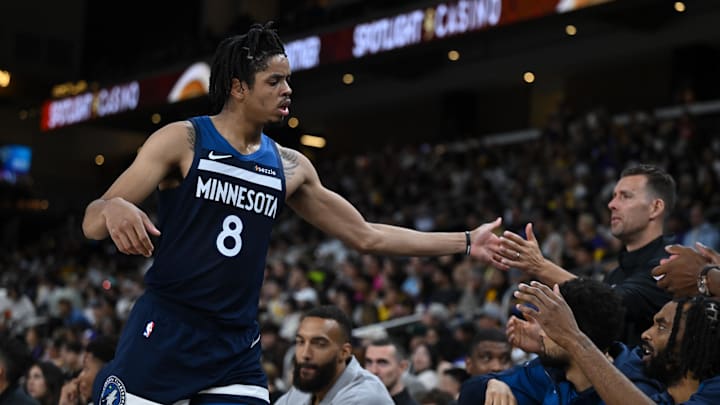 Oct 4, 2024; Palm Desert, California, USA; Minnesota Timberwolves forward Josh Minott (8) greets teammates against the Los Angeles Lakers during the second half at Acrisure Arena.