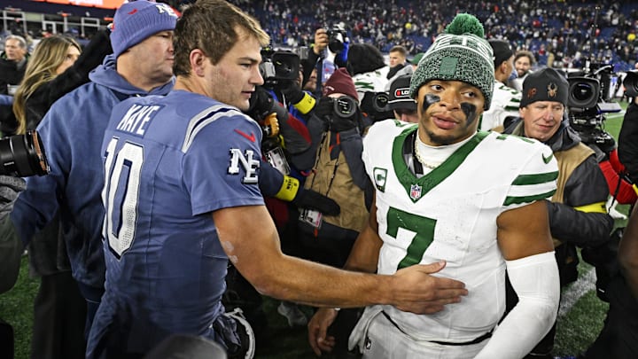 Nov 13, 2025; Foxborough, Massachusetts, USA; New England Patriots quarterback Drake Maye (10) and New York Jets quarterback Justin Fields (7) react after the game at Gillette Stadium. Mandatory Credit: Eric Canha-Imagn Images