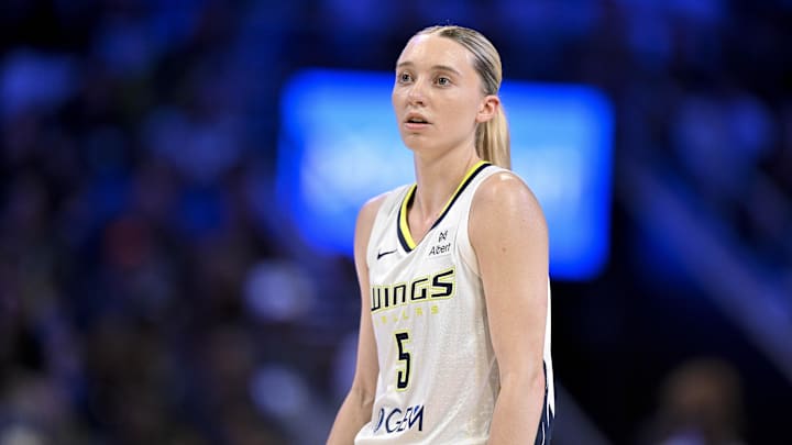 May 19, 2025; Arlington, Texas, USA;  Dallas Wings guard Paige Bueckers (5) looks on during the first half against the Seattle Storm at College Park Center. Mandatory Credit: Jerome Miron-Imagn Images