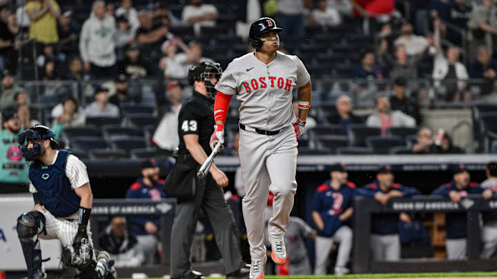 Jun 8, 2025; Bronx, New York, USA; Boston Red Sox designated hitter Rafael Devers (11) reacts after hitting a solo home run against the New York Yankees during the ninth inning at Yankee Stadium. Mandatory Credit: John Jones-Imagn Images