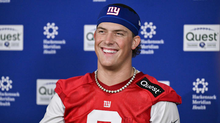May 9, 2025; East Rutherford, NJ, USA; New York Giants quarterback Jaxson Dart (6) speaks to members of the press after rookie minicamp at Quest Diagnostics Training Center. Mandatory Credit: John Jones-Imagn Images