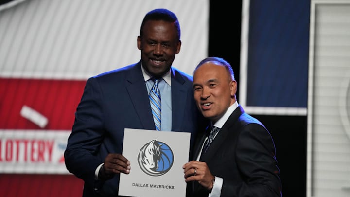May 12, 2025; Chicago, Illinois, US; Rolando Blackman of the Dallas Mavericks poses with Mark Tatum NBA Deputy Commissioner after winning the the first pick during the 2025 NBA Draft Lottery at McCormick Place. Mandatory Credit: David Banks-Imagn Images