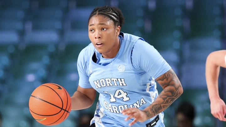 Nov 25, 2024; Paradise Island, Bahamas, BHS; North Carolina Tar Heels guard Trayanna Crisp (14) dribbles during the second half against the Indiana Hoosiers at the Atlantis Resort. Mandatory Credit: Kevin Jairaj-Imagn Images