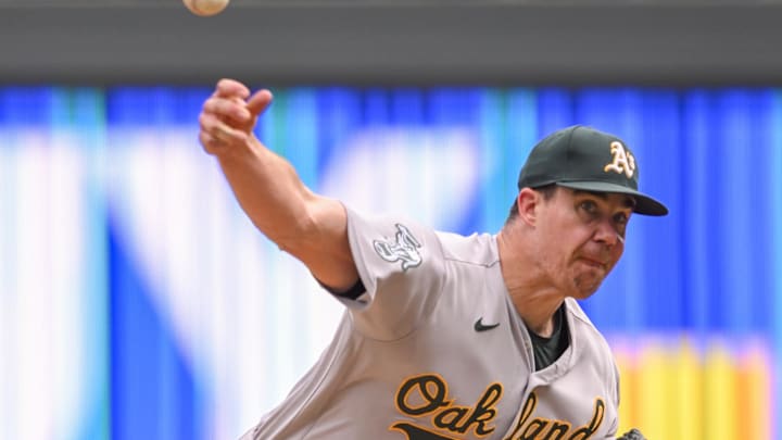 Oakland Athletics pitcher Trevor May (65) delivers a pitch against the Minnesota Twins during the ninth inning at Target Field in 2023.