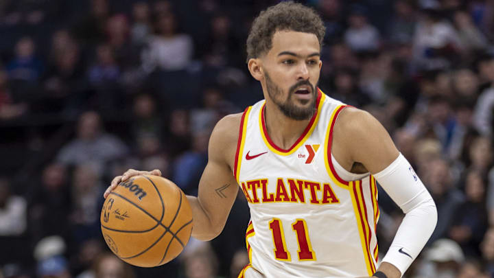 Atlanta Hawks guard Trae Young (11) dribbles the ball.