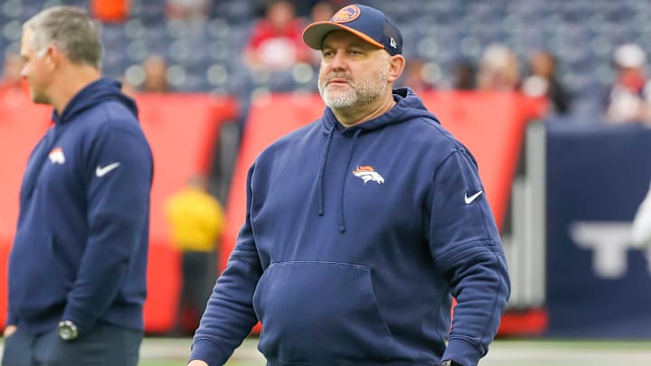 HOUSTON, TX - DECEMBER 03: Denver Broncos pass game coordinator John Morton oversees practice during the football game between Denver Broncos and Houston Texans at NRG Stadium on December 3, 2023 in Houston, Texas.