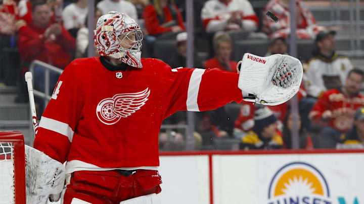 Dec 31, 2023; Detroit, Michigan, USA; Detroit Red Wings goaltender Alex Lyon (34) tosses the puck