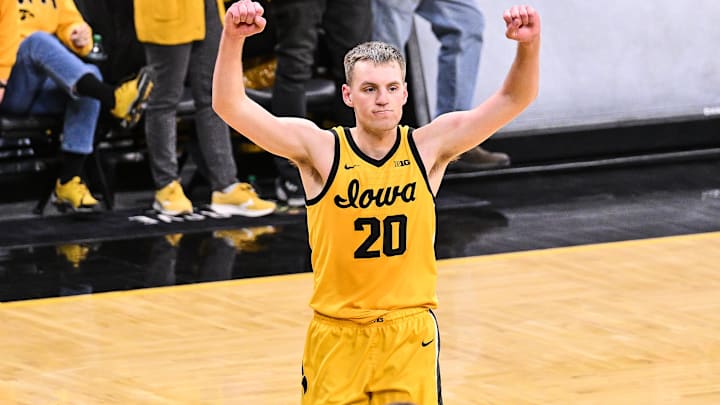 Feb 22, 2025; Iowa City, Iowa, USA; Iowa Hawkeyes forward Payton Sandfort (20) reacts after the game against the Washington Huskies at Carver-Hawkeye Arena. Mandatory Credit: Jeffrey Becker-Imagn Images