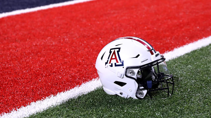 Sep 2, 2023; Tucson, Arizona, USA; Arizona Wildcats quarterback Jayden de Laura (7) helmet on the field after a victory over Northern Arizona Lumberjacks at Arizona Stadium. Mandatory Credit: Zac BonDurant-Imagn Images