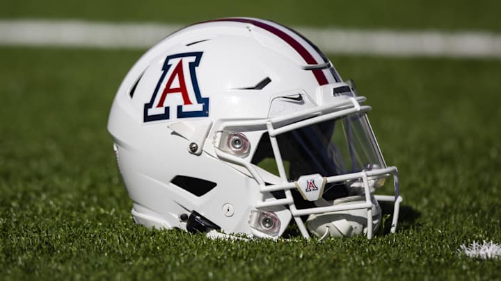 Nov 25, 2022; Tucson, Arizona, USA; Detailed view of an Arizona Wildcats helmet on the field during the Territorial Cup at Arizona Stadium. Mandatory Credit: Mark J. Rebilas-Imagn Images