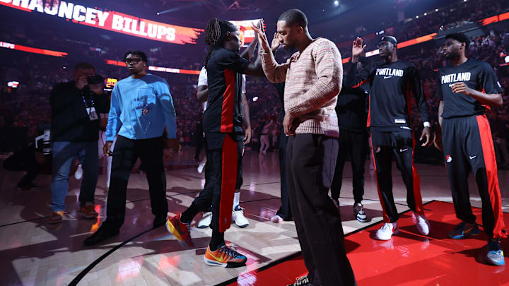 Oct 22, 2025; Portland, Oregon, USA; Portland Trail Blazers guard Damian Lillard (0) high-fives teammate Trail Blazers’ guard Jrue Holiday (5) before playing in a game against the Minnesota Timberwolves at Moda Center. Mandatory Credit: Jaime Valdez-Imagn Images Oct 22, 2025; Portland, Oregon, USA; Portland Trail Blazers guard Damian Lillard (0) high-fives teammate Trail Blazers’ guard Jrue Holiday (5) before playing in a game against the Minnesota Timberwolves at Moda Center. Mandatory Credit: Jaime Valdez-Imagn Images