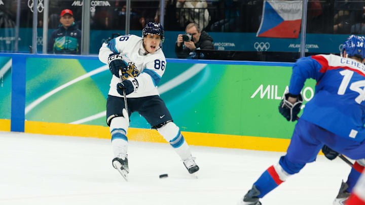 Feb 21, 2026; Milan, Italy; Teuvo Teravainen (86) of Finland passes in the second period against Slovakia in the men's ice hockey bronze medal game during the Milano Cortina 2026 Olympic Winter Games at Milano Santagiulia Ice Hockey Arena. Mandatory Credit: Geoff Burke-Imagn Images
