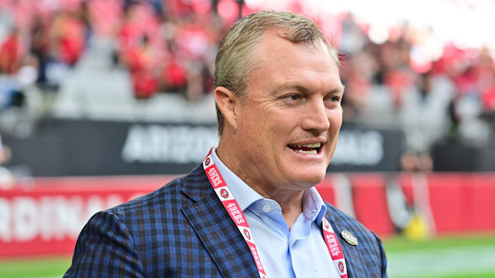 Nov 16, 2025; Glendale, Arizona, USA; San Francisco 49ers general manager John Lynch speaks on the sidelines before the game against the Arizona Cardinals at State Farm Stadium. Mandatory Credit: Matt Kartozian-Imagn Images